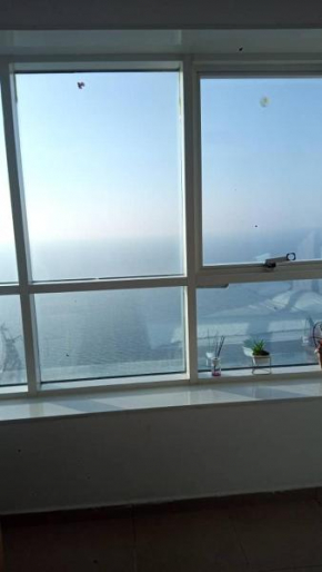 Luxury Room by the Sea Stunning View, King Bed, and Cozy Living Space - Room inside Apartment